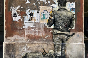 Paste up su un muro del quartiere del Carmine a Brescia