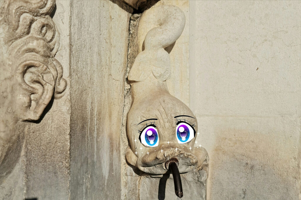 Delfino di pietra di una fontana di piazza della Loggia a Brescia