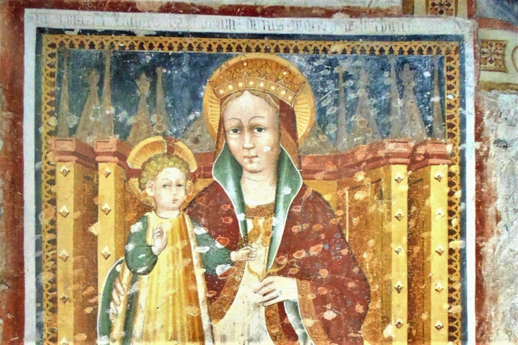 Ex voto ad affresco con la Madonna in trono con bino